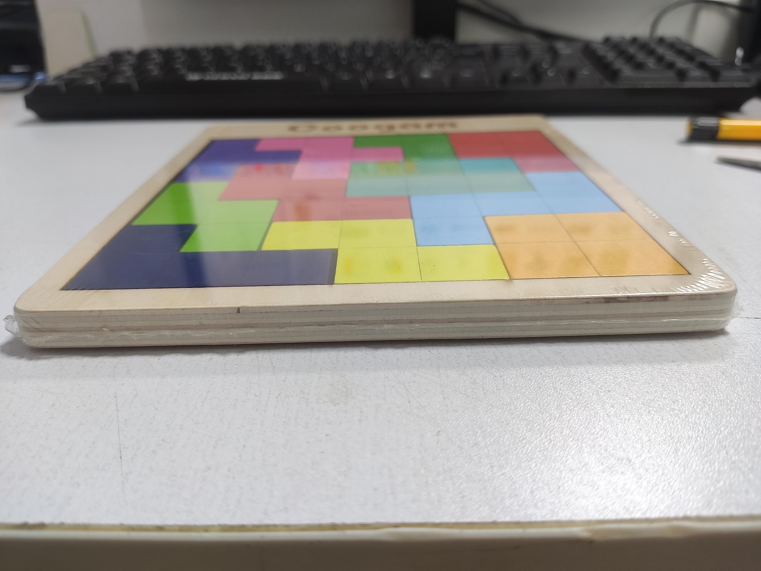 Vibrant geometric puzzle pieces enhance creativity and problem-solving in any workspace setting.