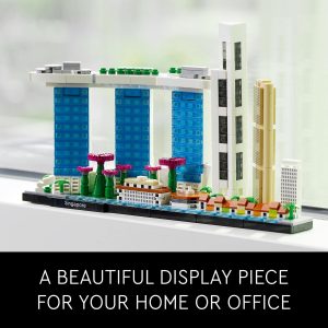 Vibrant miniature cityscape display with modern skyscrapers, greenery, and colorful accents. Perfect decor piece.