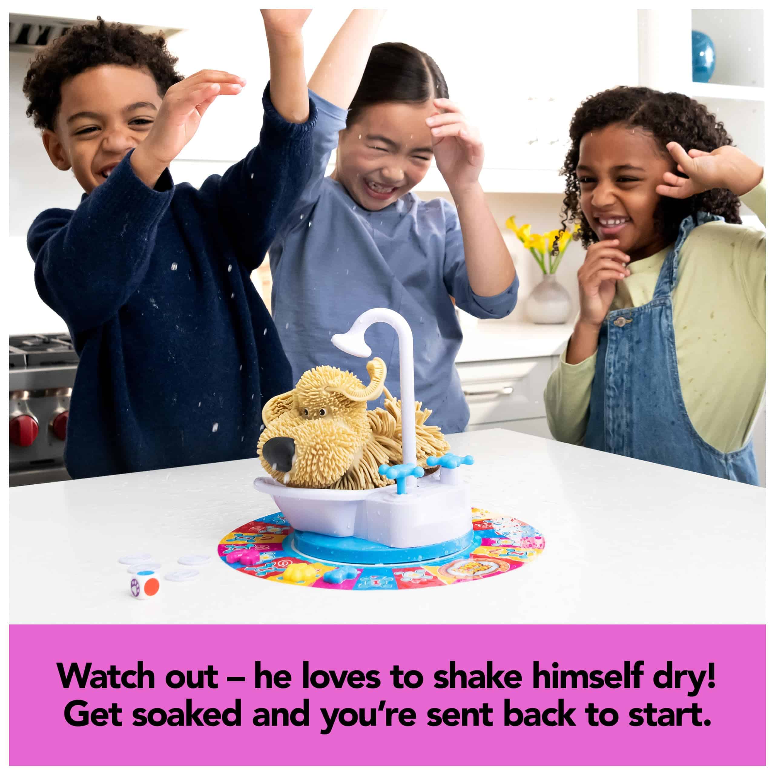 Children joyfully play a whimsical tabletop game with a playful, splashing dog feature.
