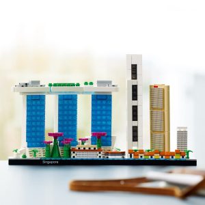 Miniature Singapore skyline model showcasing vibrant architecture, greenery, and iconic landmarks like Marina Bay Sands.
