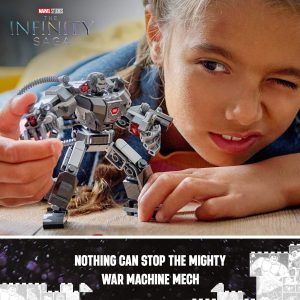 Child joyfully explores a detailed War Machine mech toy during creative playtime adventure.