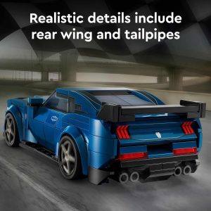 Intricately designed blue model car showcasing speed, performance, and craftsmanship in Version 1.0.0.