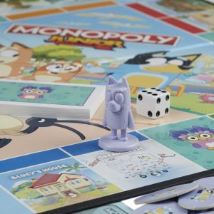 Colorful Monopoly cartoon game setup for fun family nights with vibrant characters and playful elements.