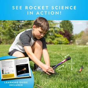Boy launches a rocket outdoors, exploring hands-on science with excitement and curiosity.