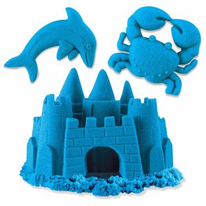 Joyful blue sandcastle adventure with a leaping dolphin and a crab by the sea.