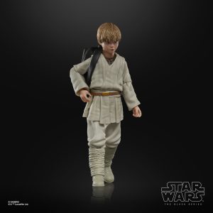 Young Jedi action figure in tunic, showcasing adventure and craftsmanship in Star Wars collection.
