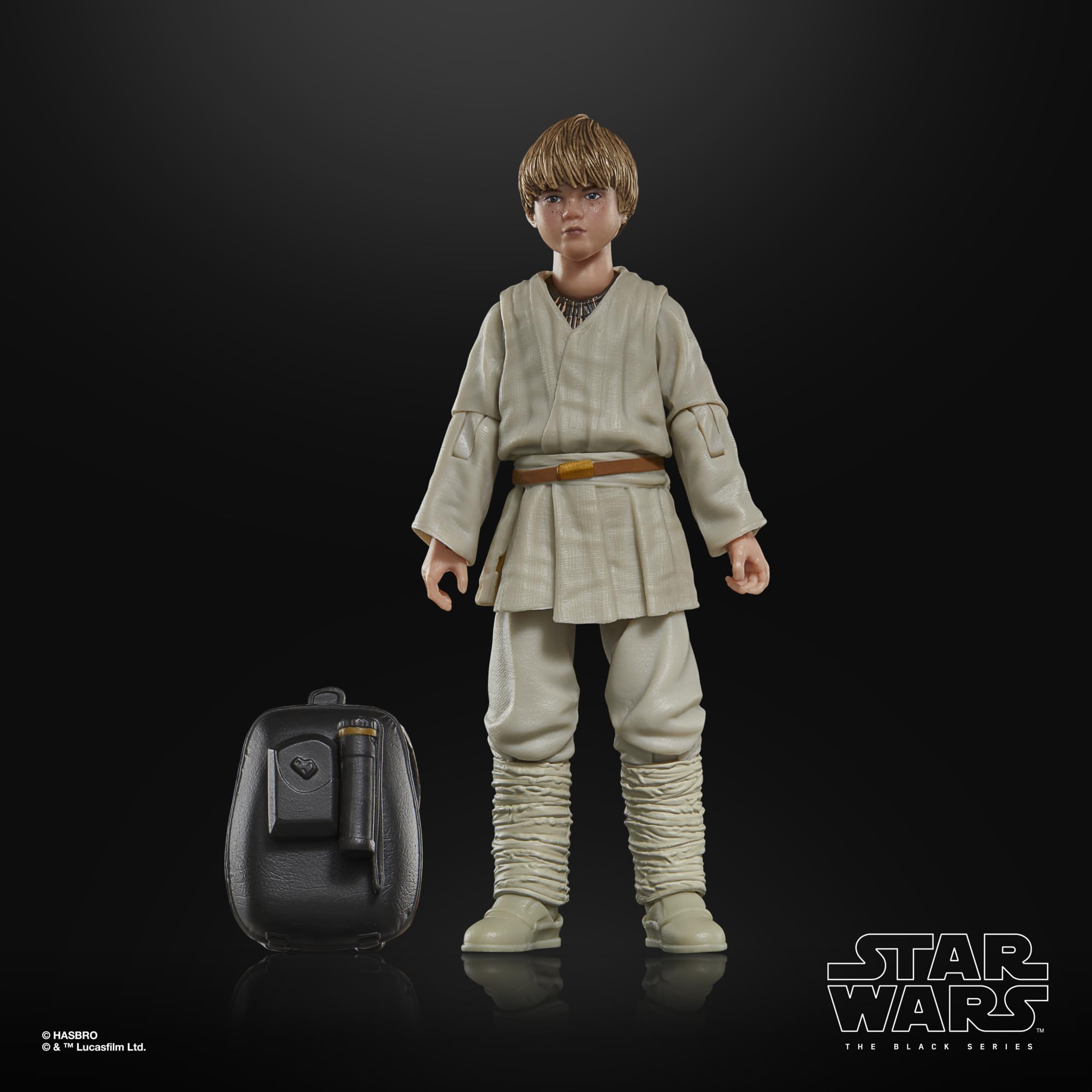 Detailed Young Padawan action figure in tunic with backpack from *Star Wars* franchise.