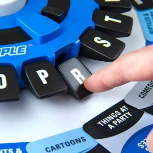 Engaging player presses R on a colorful game wheel, highlighting interactive and fun gameplay.