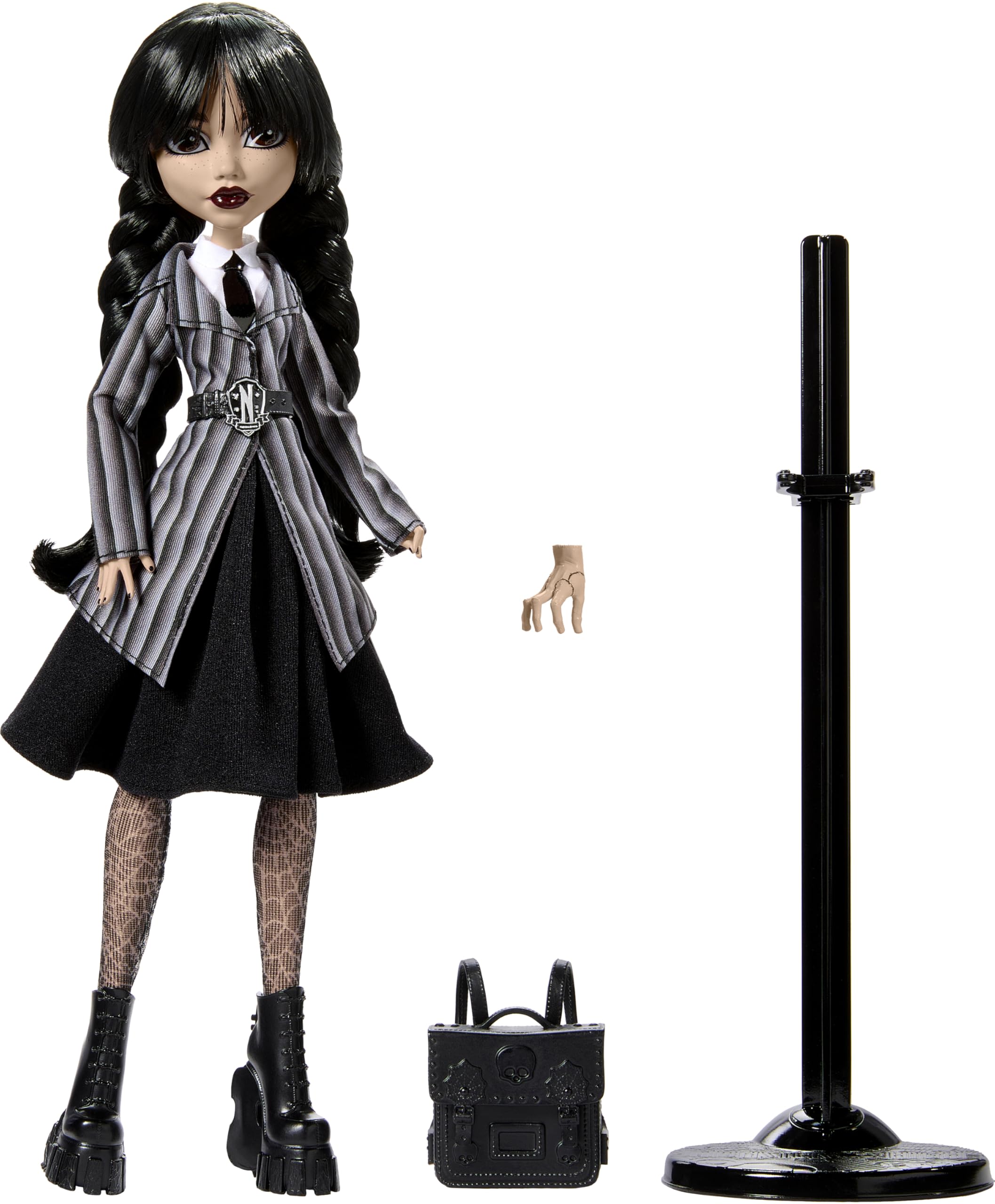 Gothic collectible doll in vintage fashion with striking accessories and dramatic makeup.