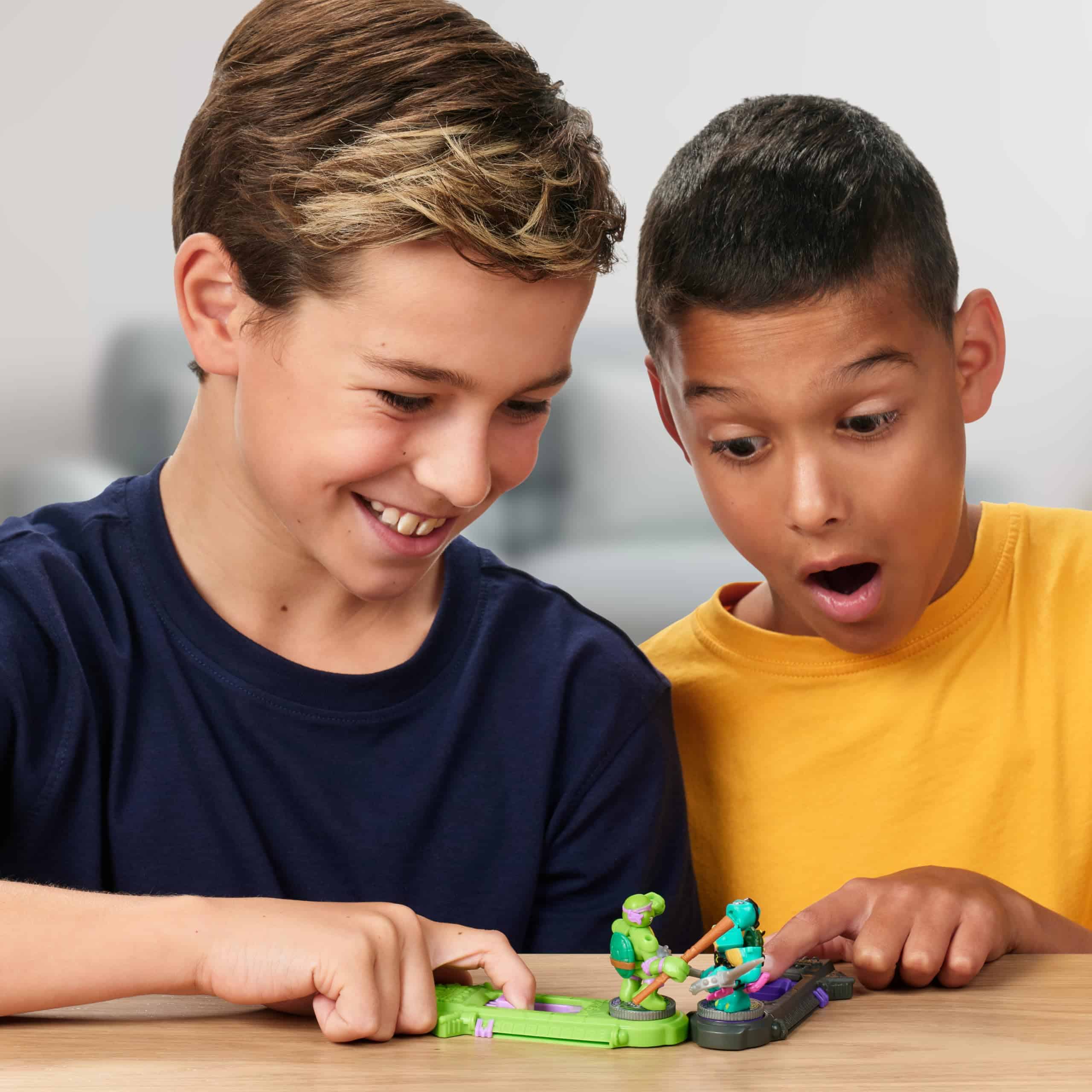 Boys joyfully playing colorful toys, showcasing their friendship and imaginative adventures together.