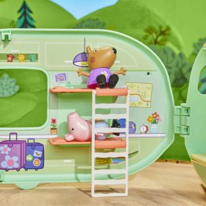 Colorful camper playset with cheerful characters inspires imaginative adventures in a scenic outdoor setting.