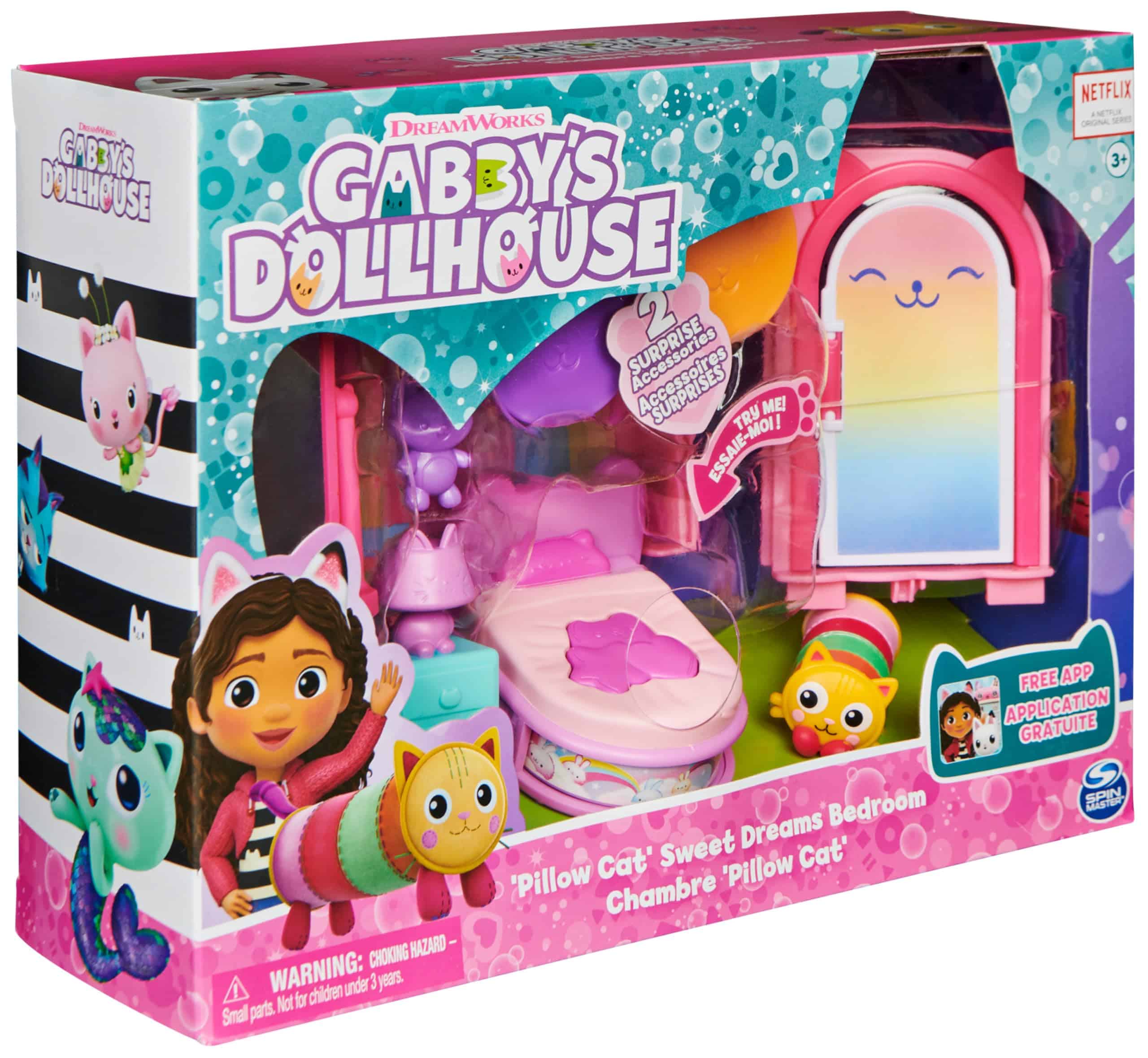 Colorful Gabbys Dollhouse playset packaging, featuring Gabby, plush bed, and adorable cat characters.
