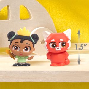 Charming toy collection featuring a girl with a crown and a curious red fox.