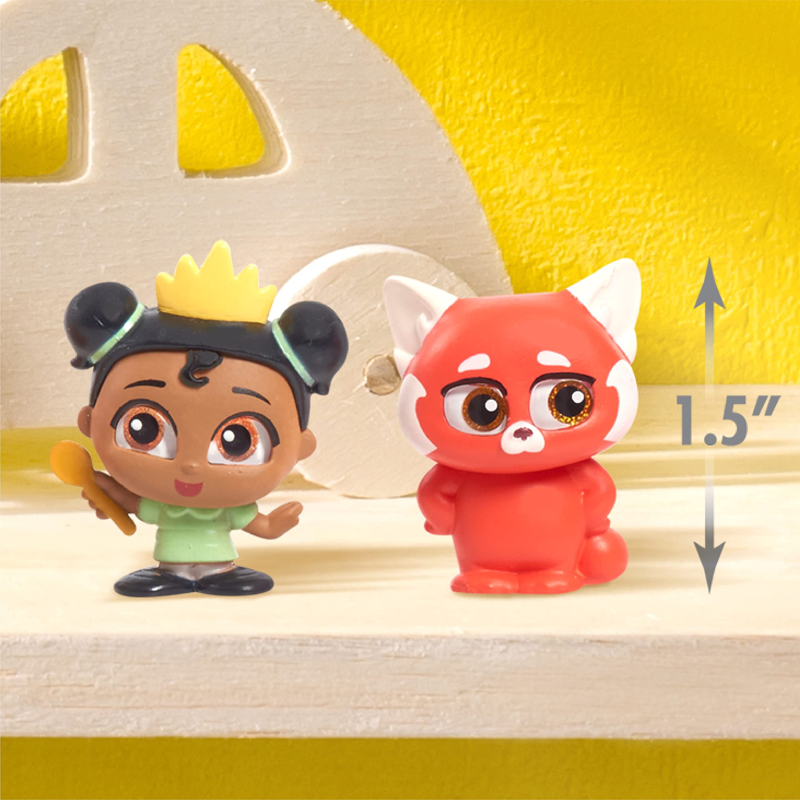 Charming toy collection featuring a girl with a crown and a curious red fox.