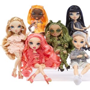 Diverse fashion dolls in vibrant styles celebrate creativity and modern trends in a playful ensemble.