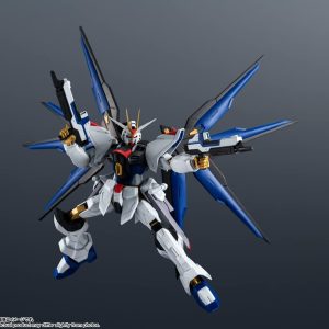 Dynamic Gundam model in striking white, blue, and red against a dark background.