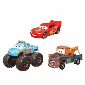 Toy vehicles from the *Cars* franchise: Lightning McQueen, a blue monster truck, and Mater.