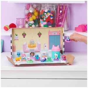 Whimsical toy playset sparks creativity with vibrant figures and colorful crafting materials.