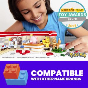 Girl joyfully assembles a colorful Pikachu Café with vibrant building blocks, sparking her creativity.