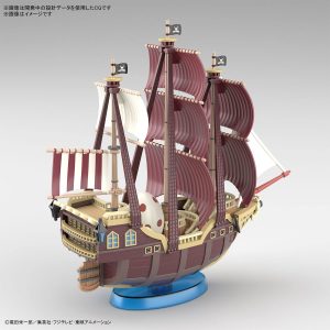 Detailed pirate ship model with maroon hull, sails, and skull flag on a blue base.