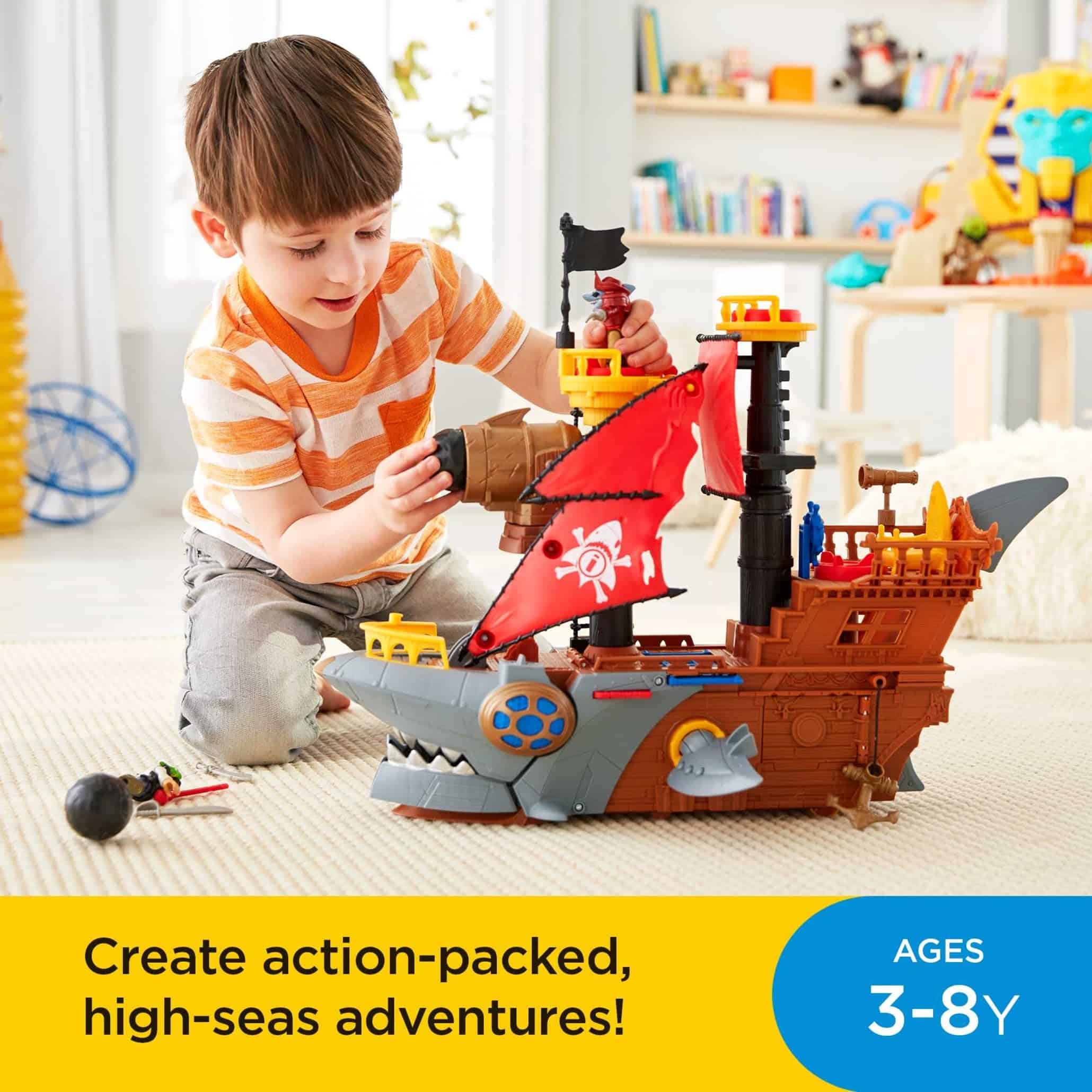 Joyful boy explores colorful pirate ship toy, igniting his imagination in a vibrant playroom.