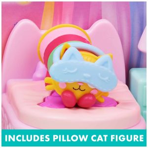 Whimsical cat toy on cozy heart-shaped bed, perfect for collectors and imaginative play.