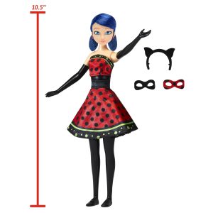 Vibrant doll in a red polka dot dress with playful blue hair and cat accessories.