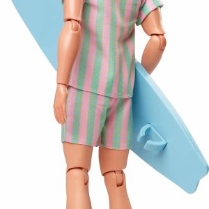 Vibrant summer doll with surfboard, embodying fun adventures and imaginative beach play.