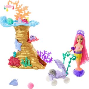 Colorful underwater playset with doll, stroller, and accessories for imaginative adventures.