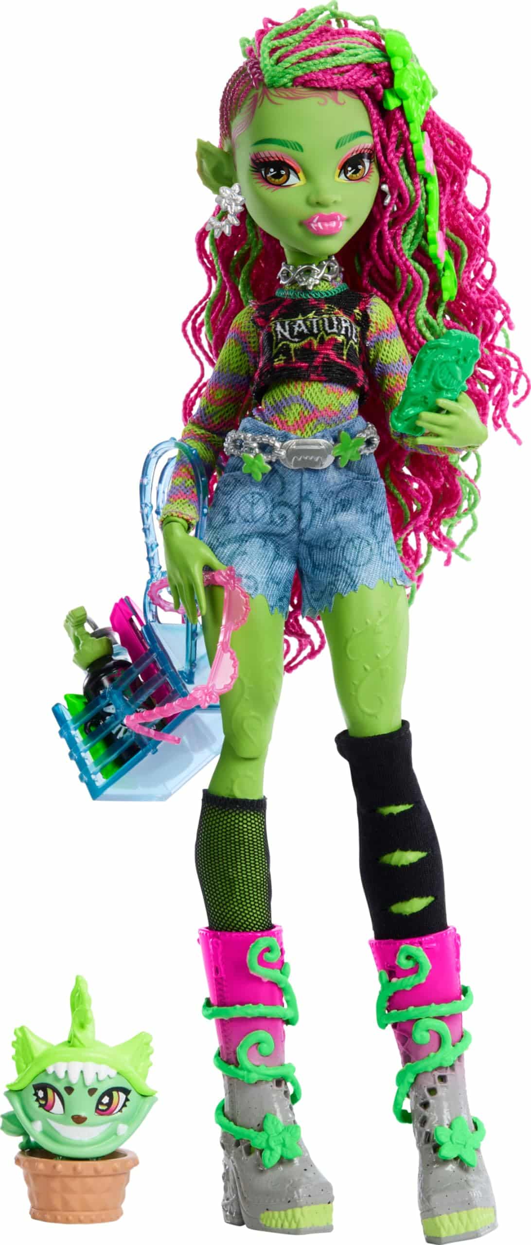 Whimsical green punk doll with trendy attire, vibrant hair, and playful accessories.