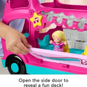 Vibrant pink toy bus opens to a fun deck, inspiring imaginative play for children.