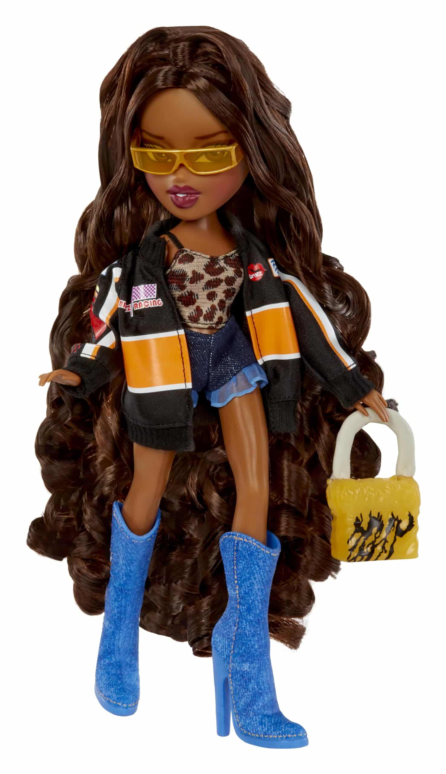 Trendy doll with curly hair, stylish outfit, and bold accessories for a fashion-forward look.