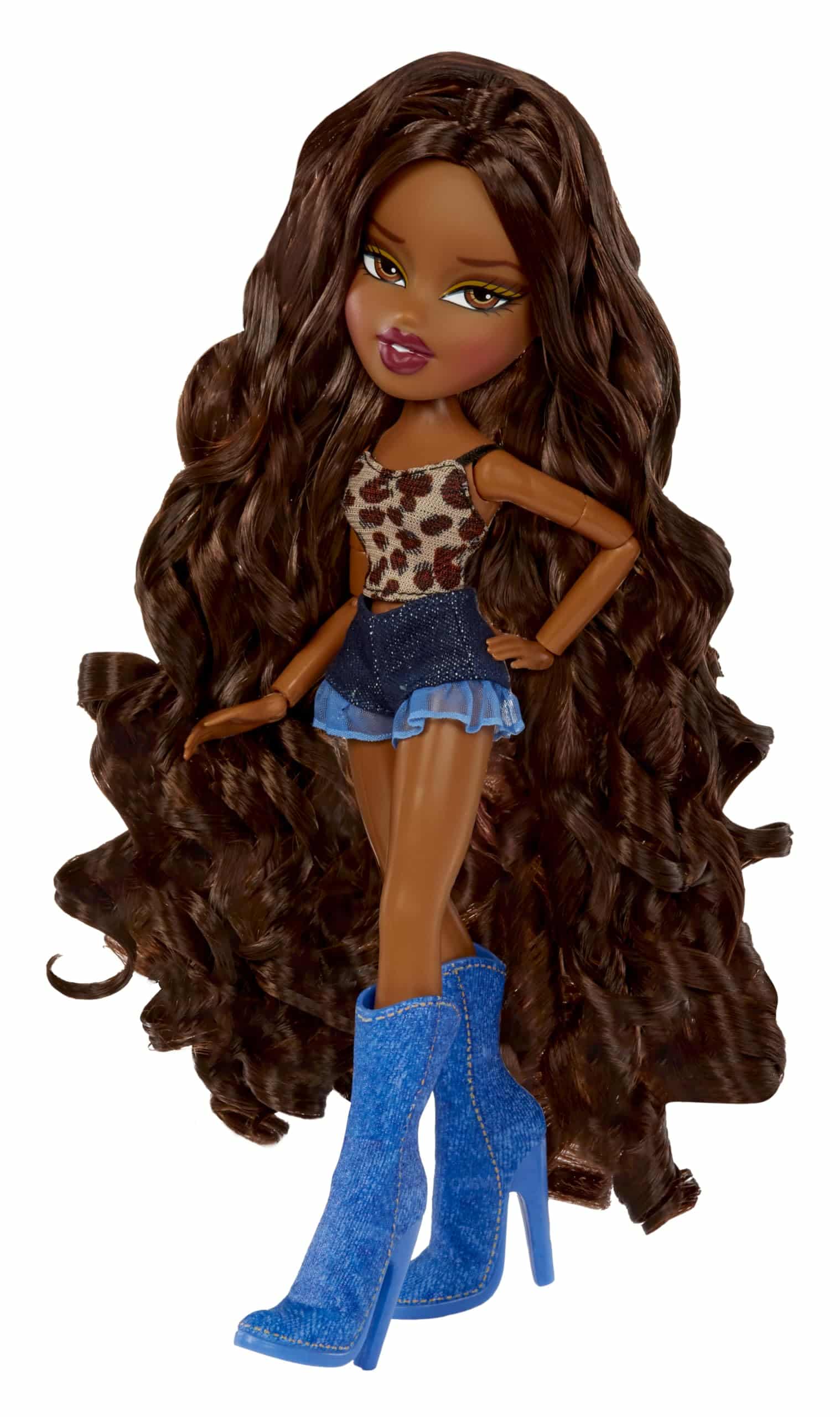 Trendy doll with voluminous hair, leopard print top, and blue high heels showcases modern style.