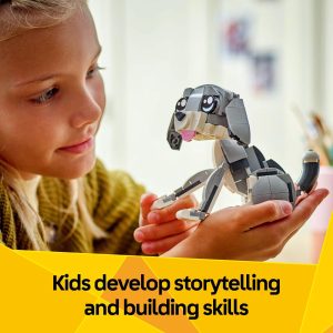 Young girl joyfully creating with dog figure in bright, engaging learning environment.