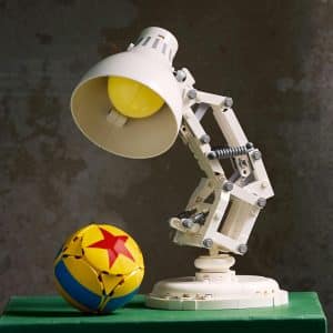 Whimsical lamp and colorful beach ball evoke childhood joy and playful creativity.