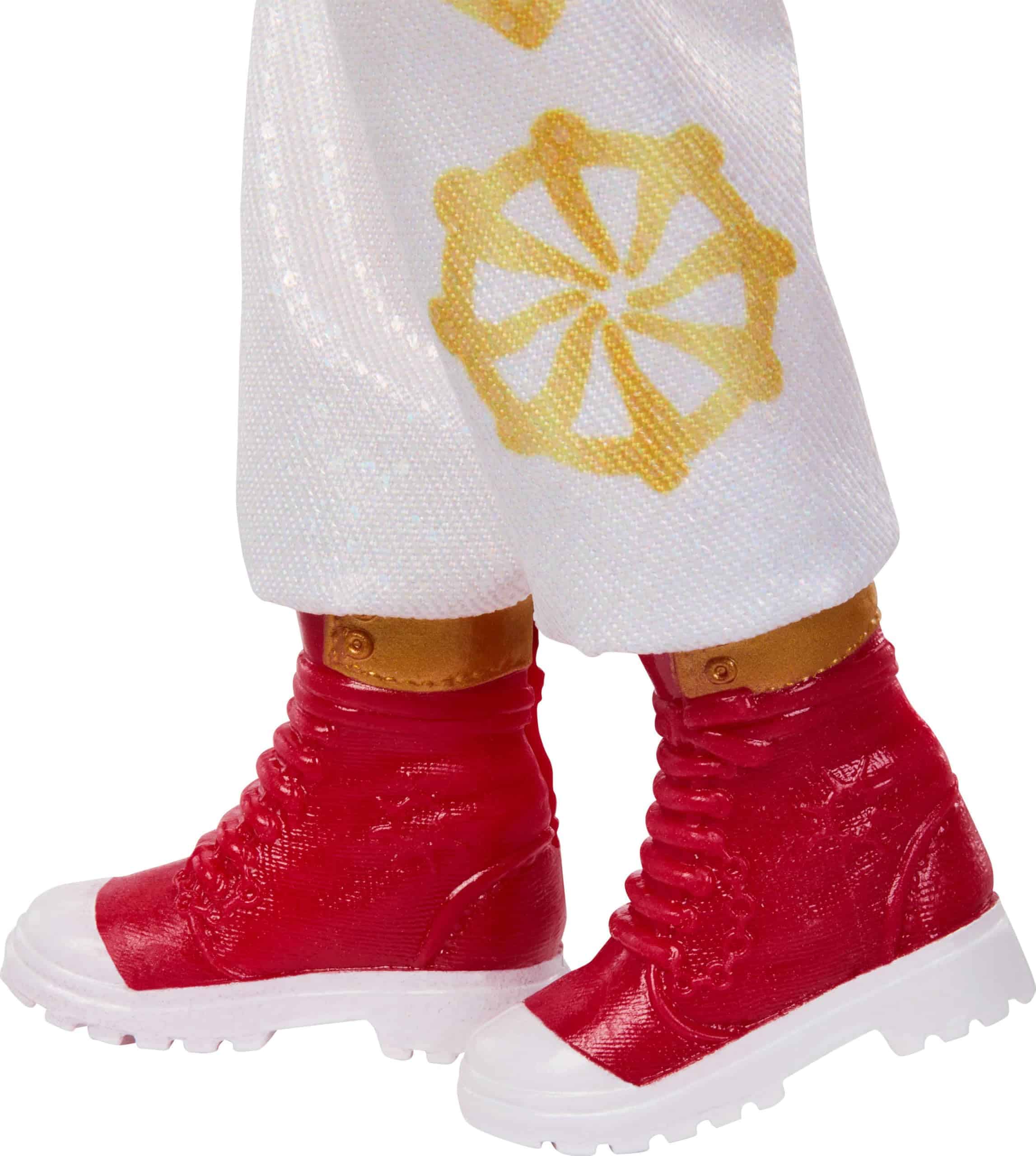 Bold red high-top boots paired with elegant white trousers featuring a striking golden design.