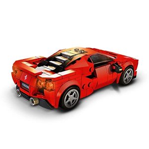 Vibrant red Ferrari F8 Tributo model car showcasing sleek design and meticulous craftsmanship.